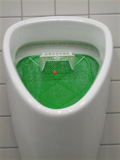 Hmmm, yes... if you must know, the mock football fields in the gents urianals. The girls haven't got one so they insisted this picture went here.