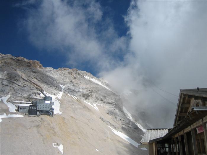 The grey building used to be an hotel, now a weather station.