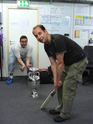 using the football cup as a set of wickets